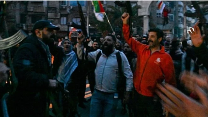 euforia tumbangnya Assad